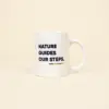 Taza Blanca para personalizar con logo azul frontal sobre fondo beige