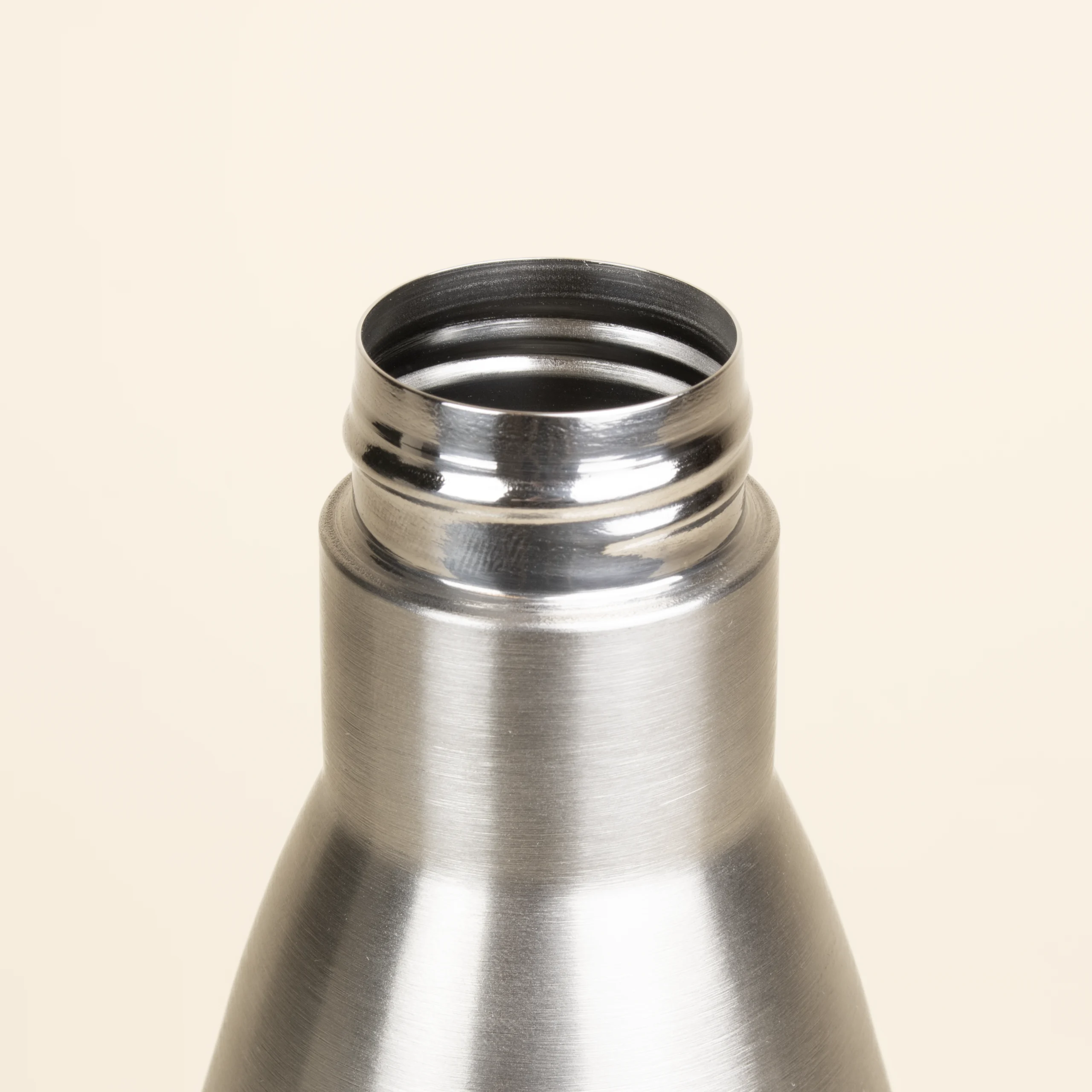 Botella acero inoxidable 1 litro Boquilla Botella acero inoxidable 1 litro abierta fondo beige