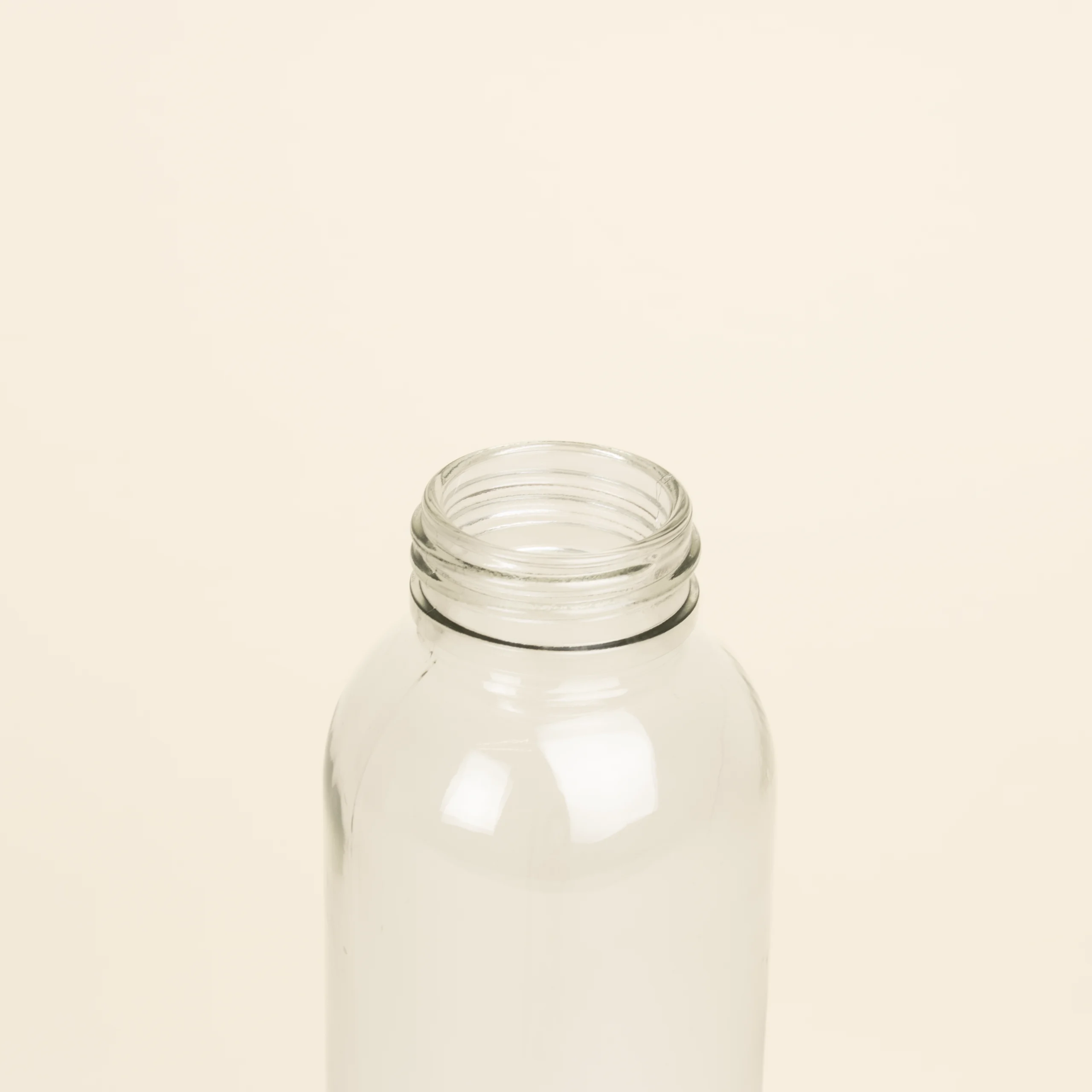 Botella de cristal personalizada abierta Botella de cristal personalizada sin tapon fondo beige