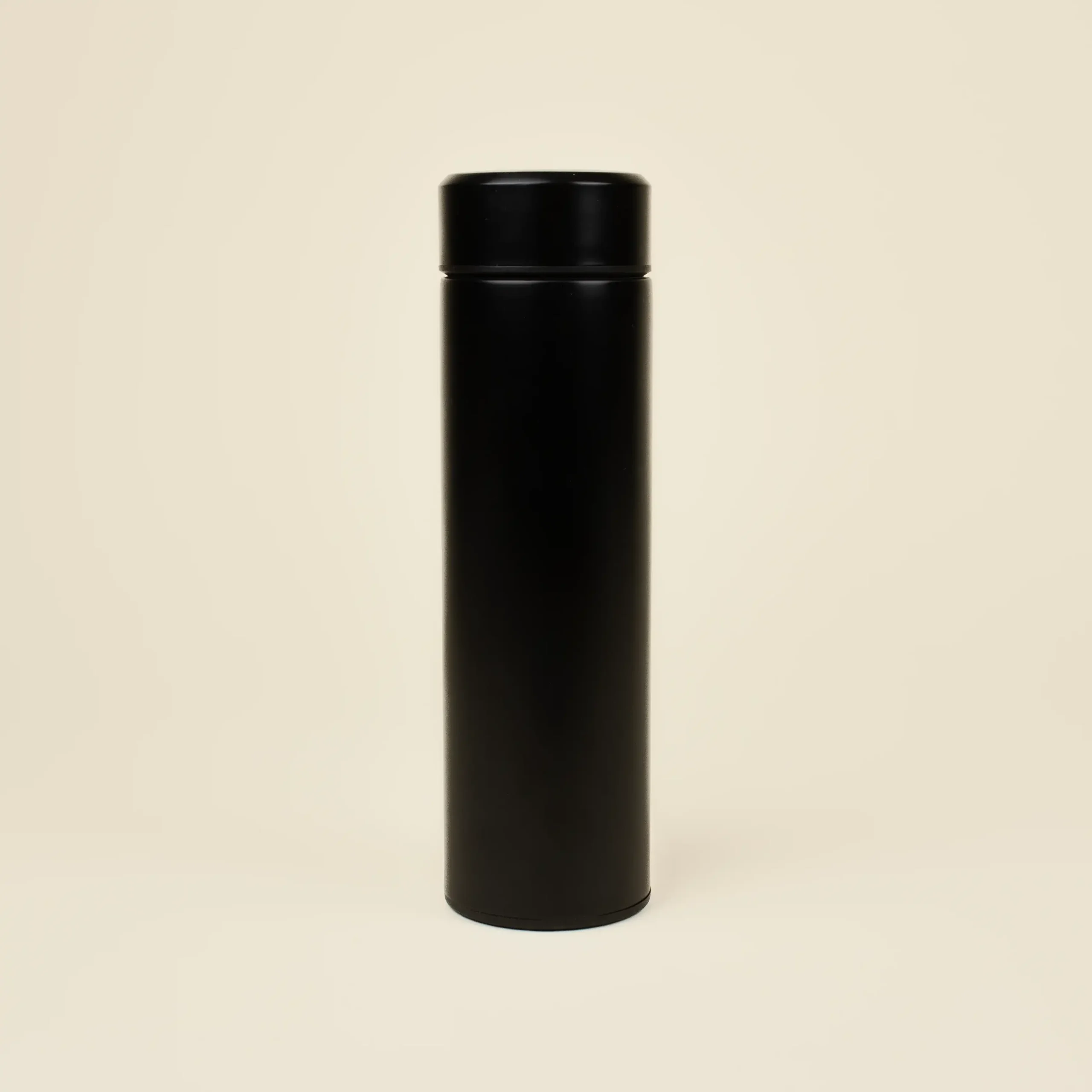 Termo acero inoxidable negro fondo beige