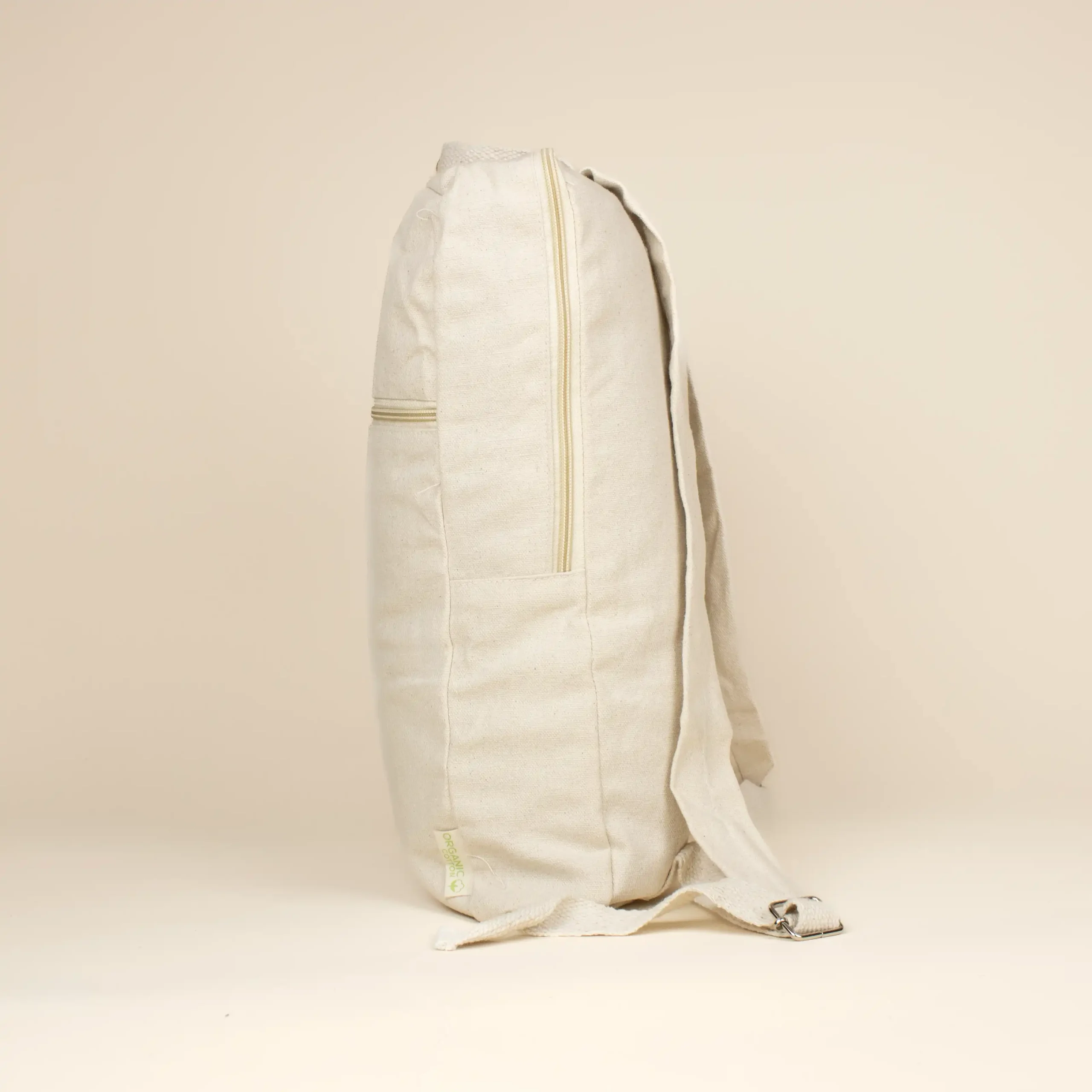 Mochila de algodón personalizada beige lateral fondo beige
