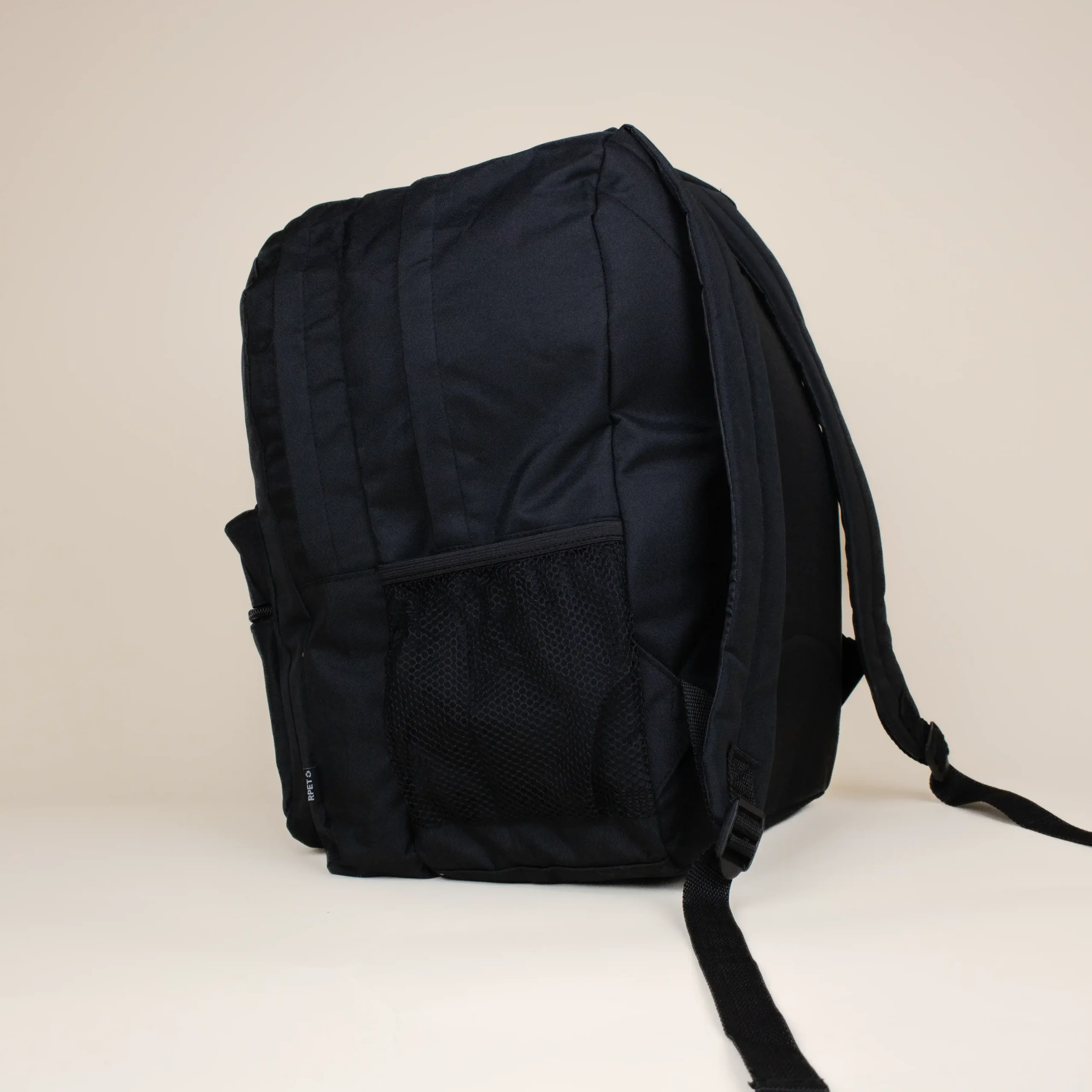 Mochila corporativa negra SWAN Lateral Mochila corporativa personalizada negra lateral fondo beige