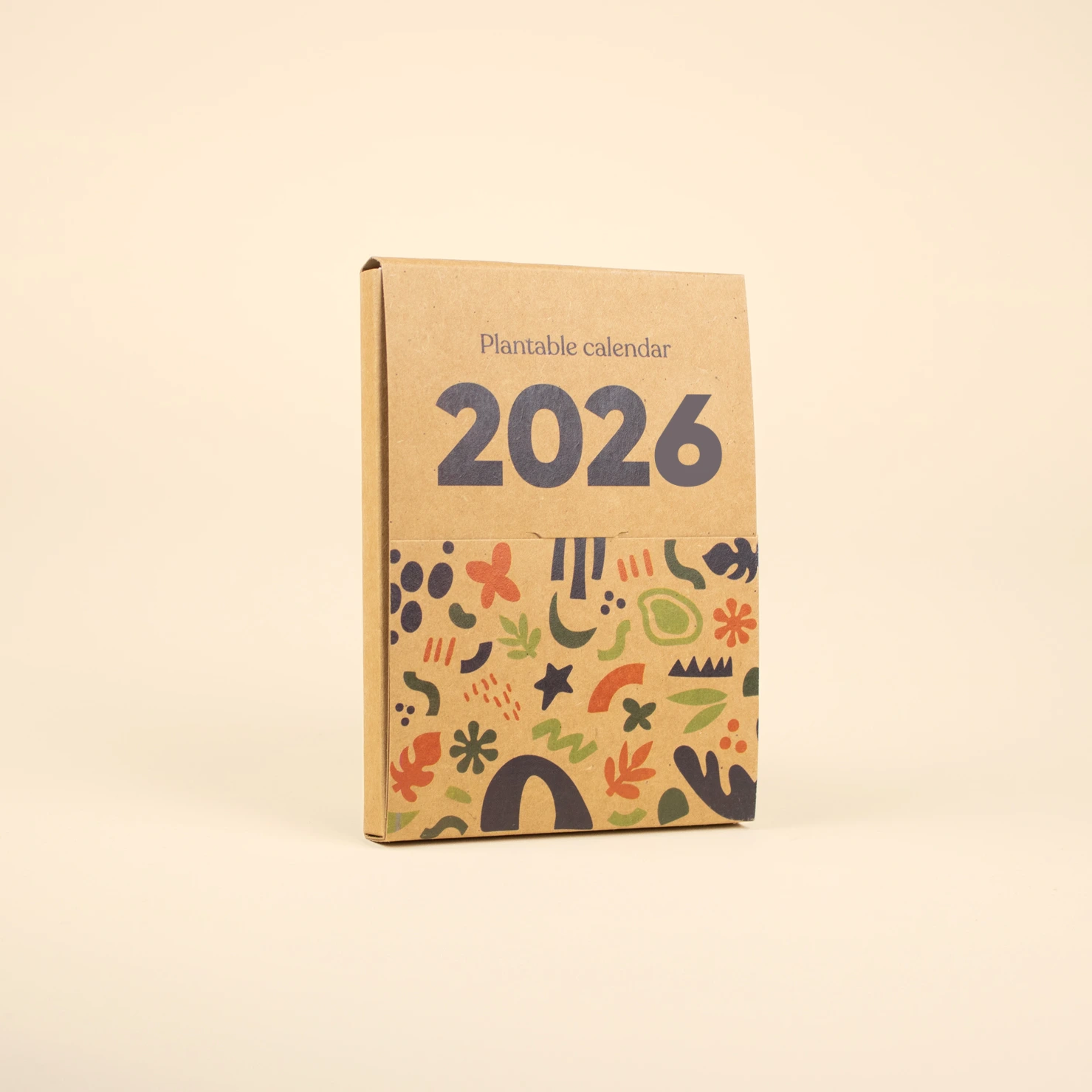 Portada 2025 de un calendario de semillas en estuche kraft personalizado