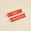 Llaveros rojos de tela bordados personalizados con logo