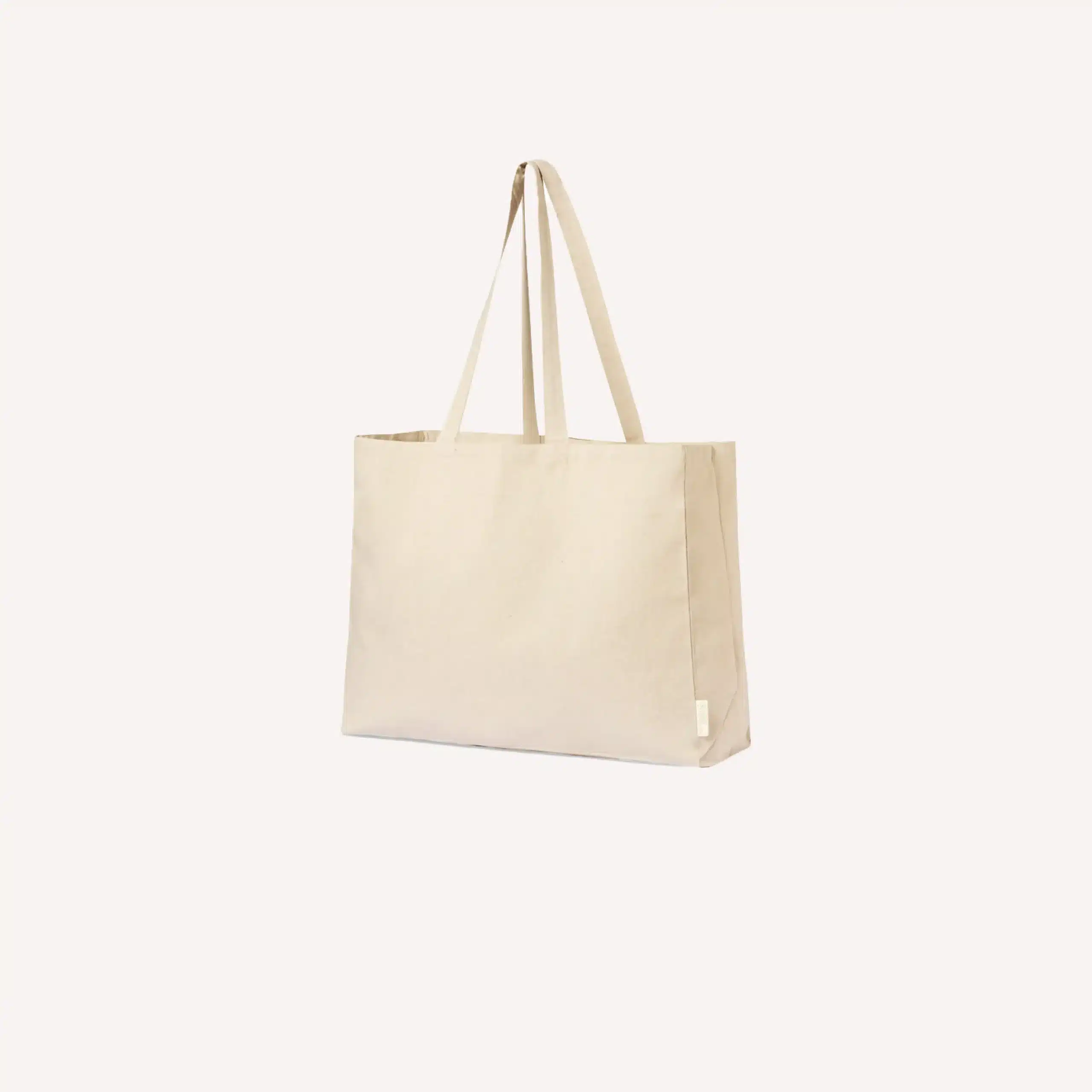 Icono bolsa beige