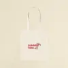 Tote bag de tela personalizada con el texto 'summer time' en rojo