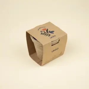 Kit plantable de fibra de coco dentro de un packaging en cartón kraft personalizado