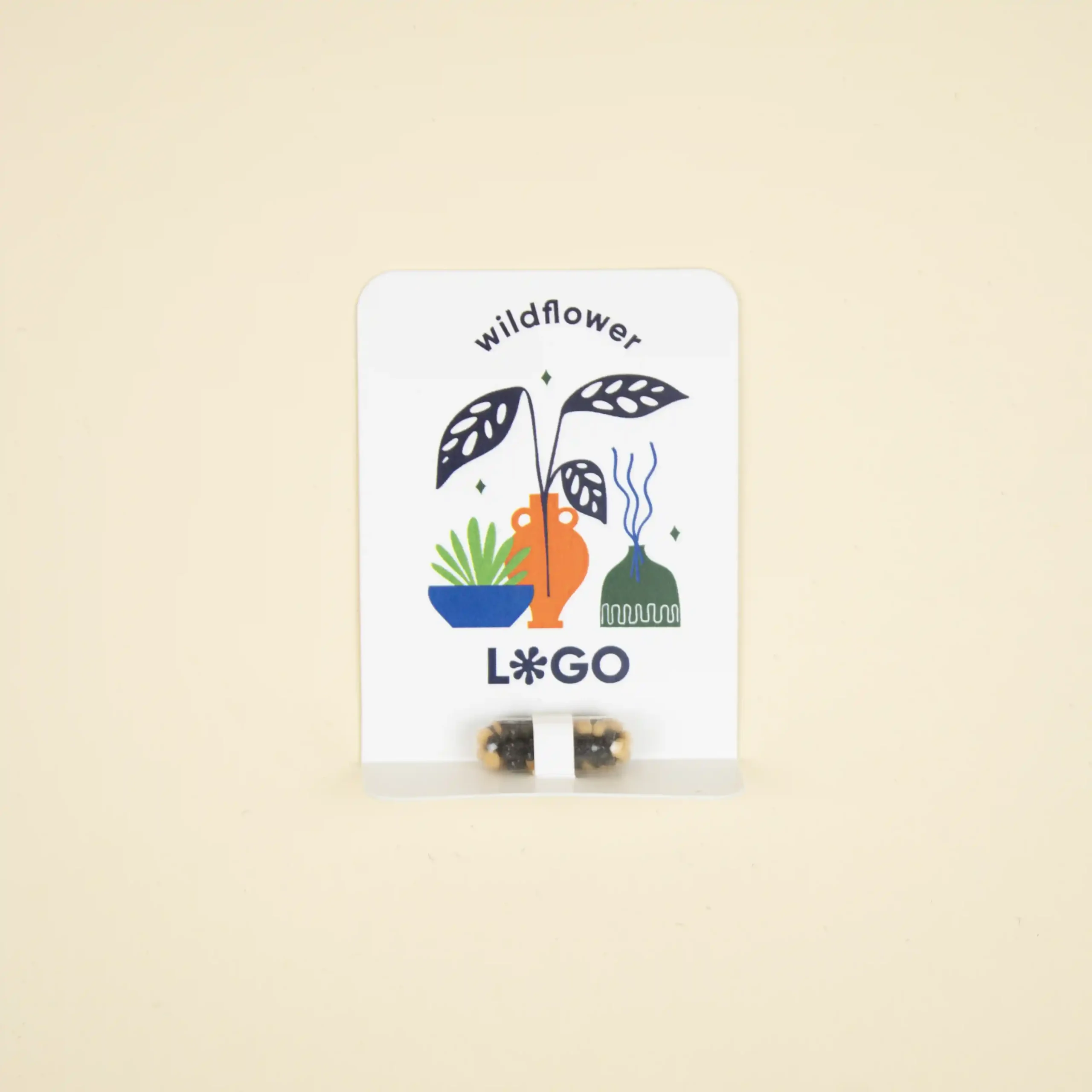 Cápsula biodegradable con semillas en su interior con packaging de cartón blanco personalizado