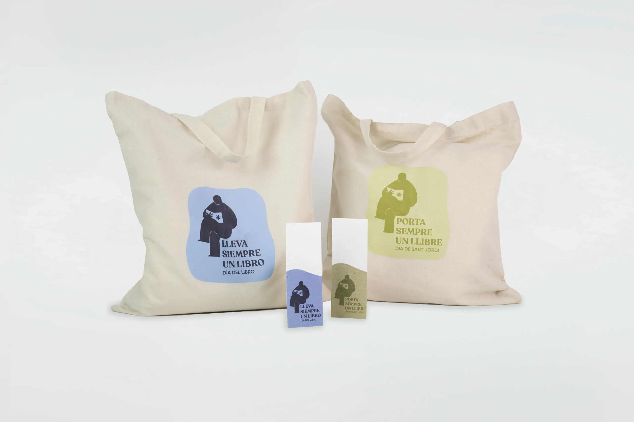 Dos tote bags de algodón y dos marcapáginas plantables personalizados con diseños con motivo del Día del Libro