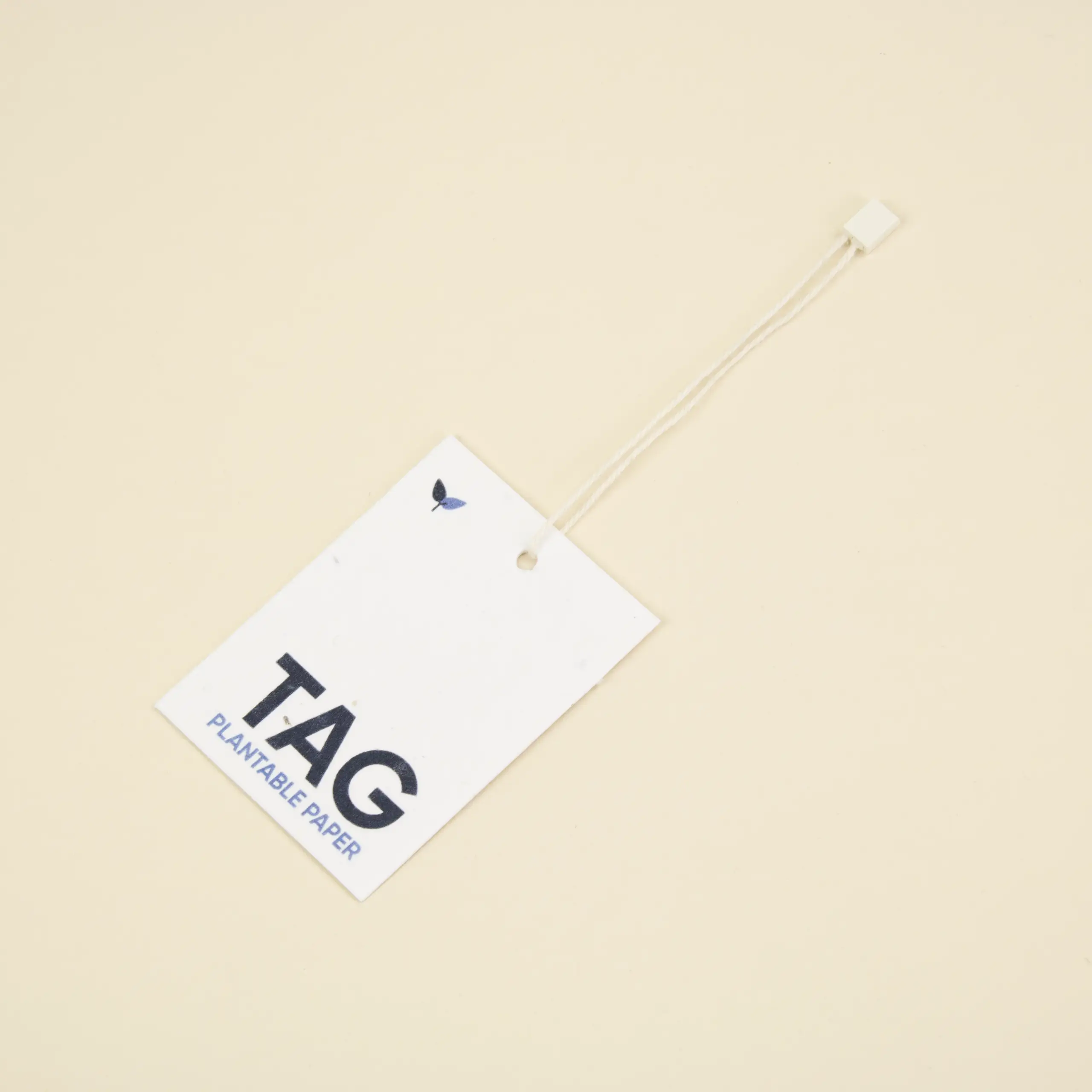 Marchamos biodegradables Etiqueta impresa en papel plantable con un marchamo biodegradable blanco