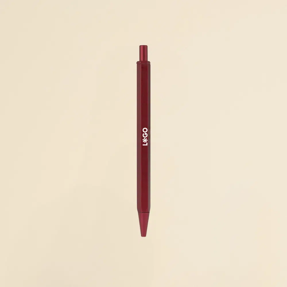 Bolígrafo hexagonal de aluminio SIXTO rojo Bolígrafo de aluminio rojo sobre un fondo beige